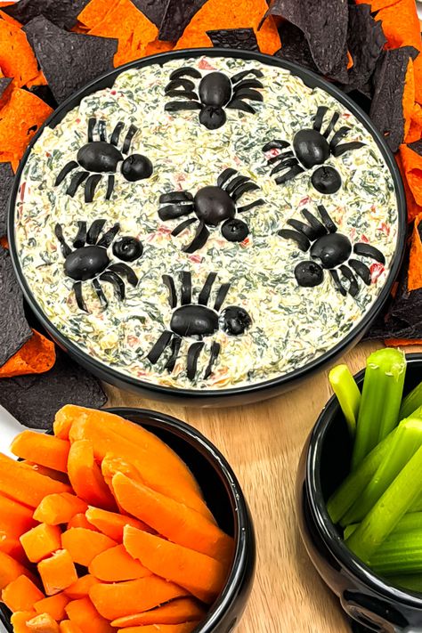 Spooky Spinach Dip is a creepy and creamy Halloween appetizer. This frightfully delicious dip comes together in just a few minutes, making it perfect for any holiday gathering. Packed with vegetables, it's a healthy and flavorful choice your guests will love. Halloween Spinach Artichoke Dip, Spooky Dips For Halloween, Hummus Halloween, Halloween Spinach Dip, Vegetarian Halloween, Halloween Dip, Spooky Recipes, Veggie Appetizers, Caprese Bites