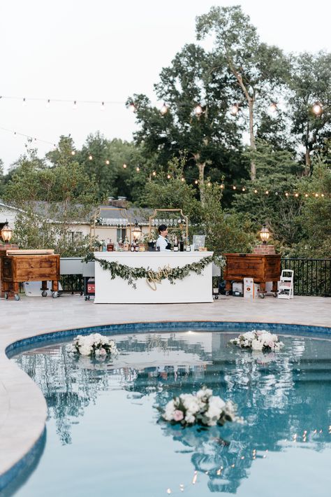 Intimate Charleston Poolside Wedding with floating florals and romantic classic planning! Backyard Wedding Reception With Pool, Simple Pool Wedding Ideas, Backyard Poolside Wedding, Wedding Pool Floating Decorations, Wedding Reception Poolside, Reception Pool Party, Pool Decorating Ideas For Wedding, Poolside Wedding Reception Backyard, Pool Decor Wedding Receptions