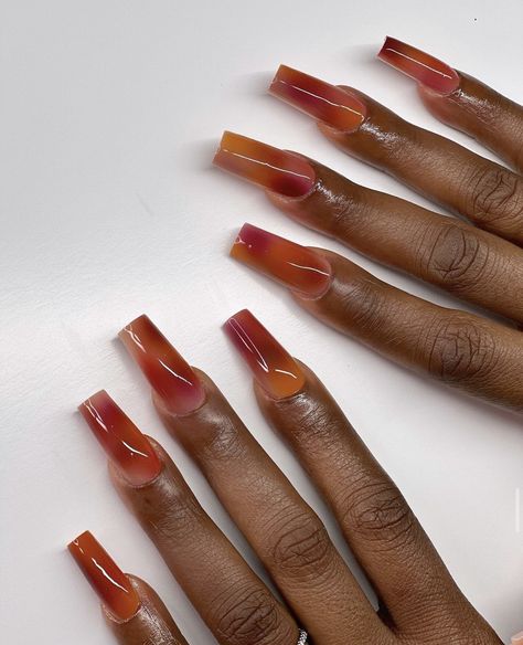 Cherry Red Nails Black Women, Burnt Orange Coffin Acrylic Nails, Aura Nails On Dark Skin, Jelly Amber Nails, Transparent Orange Nails, Jelly Square Nails, Honey Drip Nails, Jelly Orange Nails, Orange Theme Nails