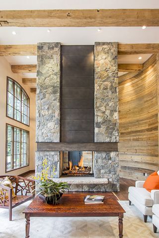 Fireplace - stone with ibeam and metal accent Metal And Stone Fireplace, Rustic Contemporary Fireplace, Two Story Fireplace With Tv, Freestanding Stone Fireplace, Indoor Rock Fireplace, Metal Fireplace Wall, Modern Stacked Stone Fireplace, Modern Stone Fireplace Ideas, Metal Fireplace Mantel