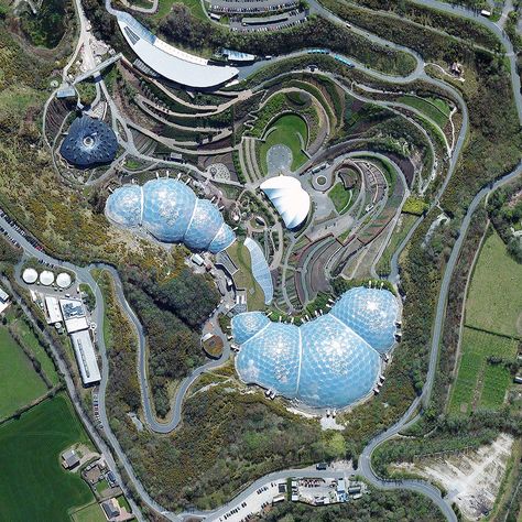 Eden Project in Bodelva, England, by architect Nicholas Grimshaw. Grimshaw Architects, Earth Day Quiz, The Eden Project, Famous Architecture, Earth Photos, Eden Project, Aerial Photograph, The Eden, Cornwall England