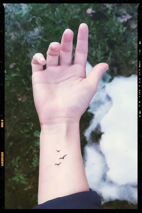 Tattoos Tatoos Wrist Women, Mini Bird Tattoos For Women, Bird Memorial Tattoos For Women, Danty Tattoos Women Wrist, Tattoo For The Wrist, 2 Birds Flying Tattoo, Small Bird Wrist Tattoo, Small Simple Wrist Tattoos, Mens Wrist Tattoos Ideas