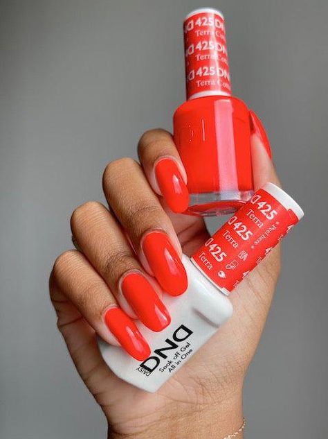 PRODUCT DETAILS: DND Gel &amp; Lacquer Duo is a high gloss shine that lasts for up to 3 weeks with no chipping or peeling and soaks completely off in only 10 - 15 minutes. This professional system offers a wide range of 379 colors that applies faster and feels thinner at reasonable prices. LED and UV cured. Made in the Dnd Red, Red Orange Nails, Dnd Gel Nail Polish, Cnd Nails, Band Nails, Dnd Gel Polish, Gel Polish Colors, Essie Nail Polish, Neon Nails