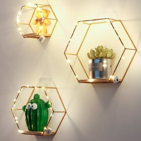 Color: gold+wood Material: iron+wood Large shelf size: 11.4 x 9.8 x 3.7 x 5.7'' Package Includes: 3Pcs x Hexagon floating shelves, 6Pcs x Traceless nails, 6Pcs x Traceless hooks, 3Pcs x LED strip lights Note: - Please refer to the measurement. Tiny measuring error is allowable in normal range. - There might be a little color difference due to the monitor, camera or other factors, please refer to the physical item. Hexagon Floating Shelves, Shelves Wall Decor, Wall Bookshelves Kids, Wall Mounted Storage Shelves, Floating Shelves Wall, Metal Storage Shelves, Hexagon Shelves, Wooden Floating Shelves, Shelves Wall