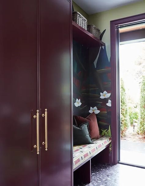 The mudroom’s bold burgundy millwork is complemented by aubergine terrazzo floors. | Photographer: Stacey Brandford | Designer: Jennifer Overweel Bold Mudroom Ideas, Funky Mudroom, Bold Mudroom, Burgundy Laundry Room, Burgundy Mudroom, Boot Room Utility, Blue Moroccan Tile, Terrazzo Floors, Mudroom Entryway