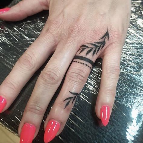 leaf wedding ring tattoo Marriage Hand Tattoo, Women’s Ring Finger Tattoo, Wedding Ring Tattoos For Couples, Ring Tattoos For Couples, Married Tattoos, Wedding Ring Finger Tattoos, Wedding Ring Tattoos, Finger Tattoo Ideas, Finger Tattoos For Couples