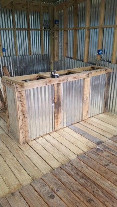 Front of bar with tin and pallet wood trim. Almost ready to put on a bar top. Bar Top Ideas, Pallet Wood Bar, Top Diy Ideas, Wood Bar Top, Tin Bar, Kimberly Smith, Pallet Bar Diy, Diy Outdoor Bar, Outside Bars