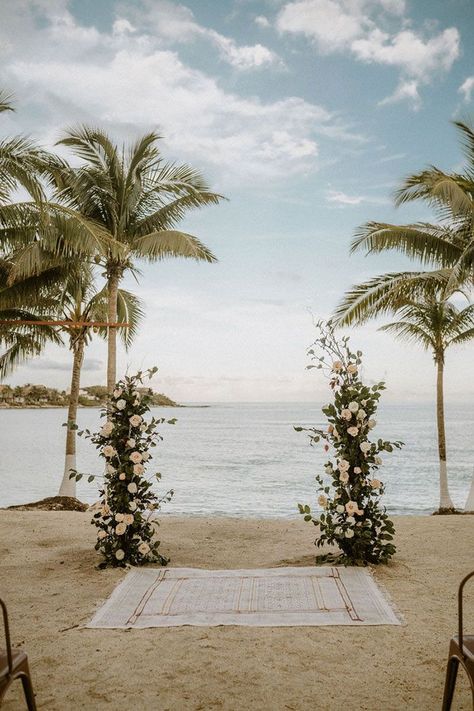 Free Standing Flower Pillars for a Beach Wedding Ceremony Floral Arch Beach Wedding, Wedding Arch Beach Simple, Beach Wedding Arbour, Ceremony Backdrop Beach, Standing Beach Wedding Ceremony, Simple Ceremony Backdrop Outdoor, Wedding Alter Backdrop Outdoor, Wedding Alter Pillar, Floral Pilar Wedding