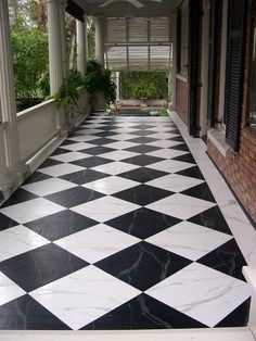 Painted concrete floors look spectacular. Use concrete floor paint, prepare your surface & add a design. Paint, Stain or dye. Videos and tutorial here. Porch Tiles, Checkered Floor, Car Porch, Porch Tile, Painted Concrete Floors, Painting Tile Floors, Diy Patio Decor, Painted Patio, Painted Floor