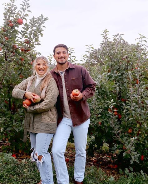 Apple Orchard Photoshoot Couple, Apple Orchard Couples Photoshoot, Apple Picking Engagement Photos, Apple Picking Aesthetic Couple, Couple Apple Picking Pictures, Apple Orchard Couple Pictures, Couple Apple Orchard Pictures, Fall Couples Photoshoot Apple Orchard, Apple Picking Pictures