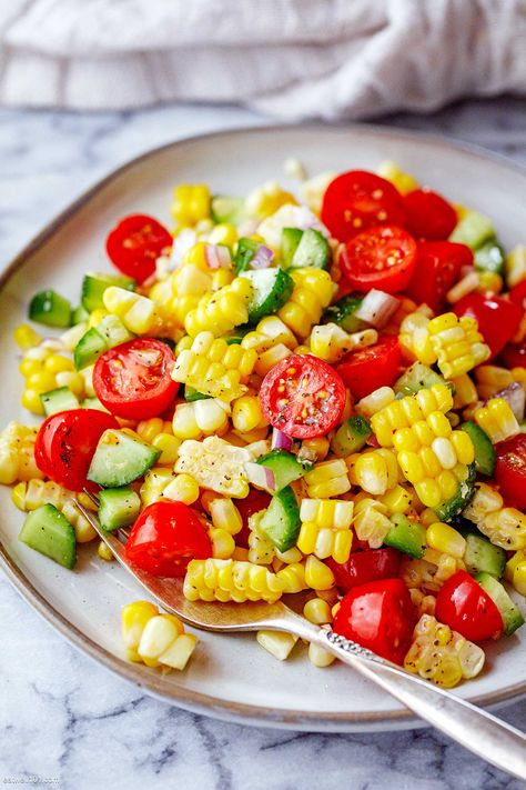 Tomato Corn Salad - #corn #salad #recipe #eatwell101 - Fresh corn salad with cherry tomatoes, cucumber and a simple lime dressing! This corn salad is delicious served on its own or as a side! - #recipe by #eatwell101® Tomato Corn Salad Recipes, Tomato And Corn Recipes, Italian Corn Salad, Corn And Tomato Salad Recipes, Corn And Tomatoes Side Dish, Fresh Corn Salad Recipe, Corn Tomato Cucumber Salad, Shoe Peg Corn Salad, Best Corn Salad Recipe