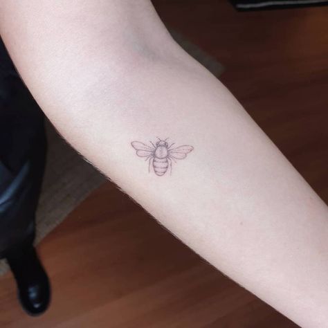 Fine line bee tattoo on the inner forearm. Bee Tattoo Fine Line, Line Bee Tattoo, Fine Line Bee Tattoo, Honey Bee Tattoo, Tattoo Fine Line, Inner Forearm, Petite Tattoos, Bee Tattoo, Large Tattoos