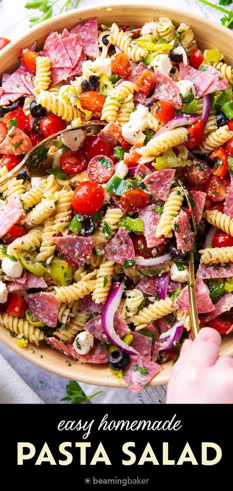 The Italian Pasta Salad is packed with meat, cheese, pasta, and zesty Italian dressing, topped with parmesan. It also includes red onion, pepperoncini, black olives, and fresh vegetables for a flavorful dish. | Recipe at BeamingBaker.com Pasta Salad Olive Garden Dressing, Pasta Salad Recipes With Italian Dressing, Healthy Italian Pasta Salad, Zesty Italian Pasta Salad, Pasta Salad Dressing Recipe, Pasta Salad With Italian Dressing, Beaming Baker, Homemade Pasta Salad, Salad Italian