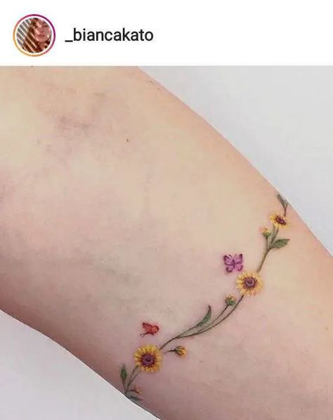 11 Pretty Sunflower Tattoo Ideas for Females 12 Tattoo Ideas For Females, Sunflower Tattoo Ideas, Sunflower Tattoo Simple, Small Colorful Tattoos, Butterfly Wrist Tattoo, Flower Wrist Tattoos, Anklet Tattoos, Tasteful Tattoos, Sunflower Tattoos