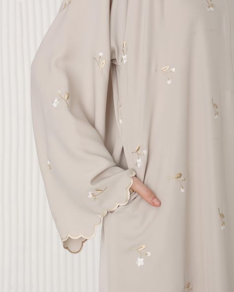 Introducing the highly sought-after Takisha Abaya, making a comeback tomorrow with exciting new colors: Beige and Sage! If you love floral and scallop trimmings on your abaya sleeves, Takisha Abaya is your ultimate pick! Stay tuned for Eden Elegant Collection Pre-Order coming to you tomorrow. Don’t miss it❤️ Color Abaya Design, Abaya Embroidery Design, Abaya Sleeves Design, Unique Abaya Designs, Embroidered Abaya Designs, Embroidery Abaya Design, Abaya Designs Pattern, Spring Luxury Embroidered Abaya, Spring Abaya With Floral Embroidery