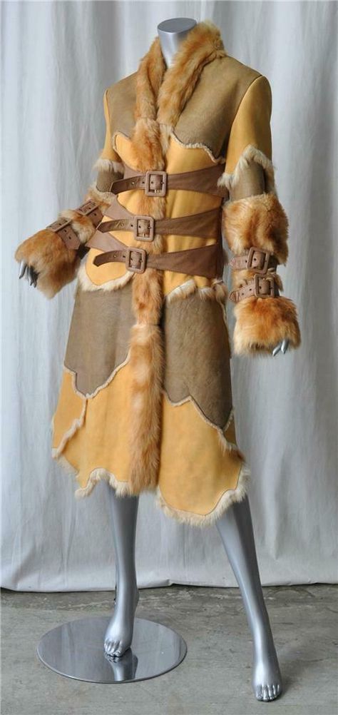 Stunningly beautiful shearling/fur coat - so ultra warm and deluxe! The buckles are absolutely gorgeous and lend so much style to this patchwork coat - retails for $5,000.00. Designer: Voyage Condition: New without tags; the care label states that the hide naturally has imperfections in the leather and that even with premium hides this is the case. We think it only adds to the character of the coat anyway - it looks gorgeous! Color: Brown, Tan, Light Golden Pumpkin and Dark Honey Content: Shearling Leather/Fur - we're uncertain what kind of fur the longer one is - but it's soft and has a beautiful wave to it. Unlined, but is soft shearling and fur on the inside Designer Size: Marked US 10, IT 44, FR 40, but best for a US 4/6. Made in: Italy Measurements (taken with garment lying flat): Che Fur Runway, Patchwork Coat, Inuit Art, Long Coat Jacket, Funky Outfits, Fantasy Story, Medieval Clothing, Fur Fashion, Alternative Outfits