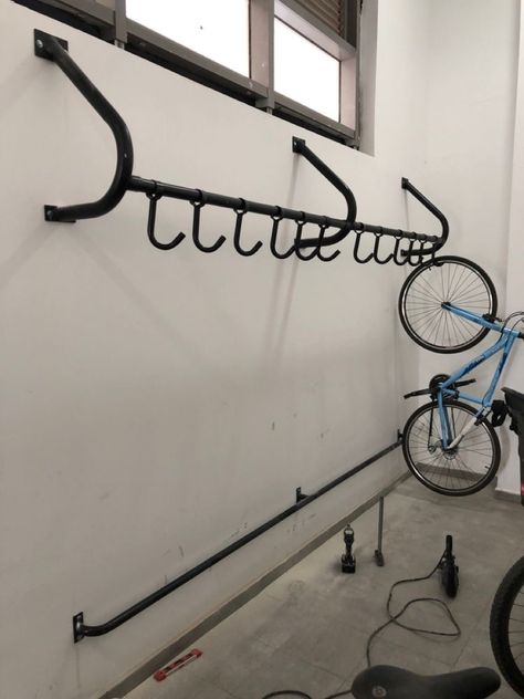 Bicycle Hanging Ideas, Bicycle Rack Design, Bike Hanger Wall, Bicycle Parking Design, Wall Mounted Bike Storage, Garden Bike Storage, Rack Velo, Bicycle Room, Outdoor Bike Storage