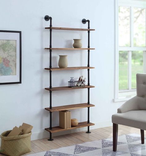 Modern Farmhouse Is Out—and Industrial Farmhouse Has Taken Its Place | realtor.com® Café Interior, Pipe Shelf, Industrial Home Design, Diy Pipe, Salon Suites, Industrial Interior Design, Industrial Shelving, Metal Pipe, Industrial Farmhouse