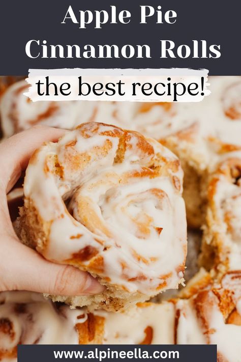 A hand grabbing a cinnamon roll covered in icing. Apple Sweet Rolls Recipe, Apple Cider Cinnamon Rolls, Cinnamon Rolls With Apple Pie Filling Recipe, Upside Down Apple Pie Cinnamon Rolls, Apple Rolls Recipe, Apple Cinnamon Rolls Homemade, Recipe Using Canned Cinnamon Rolls And Apple Pie Filling, Apples And Cinnamon Rolls, Apple Filling Recipes