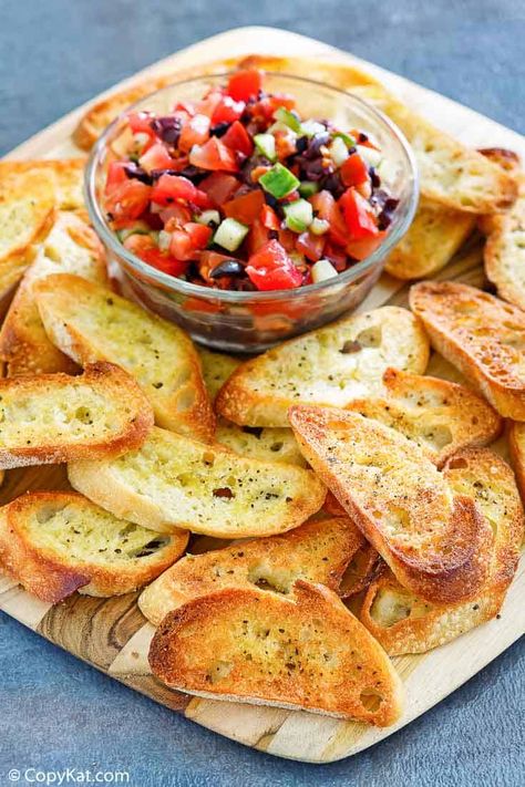 Homemade crostini is one of the most versatile appetizers. You can make ahead then serve with so many different toppings and spreads. Find out how to make the best crostini with this easy recipe with video. Get tips for which bread to use, how to slice, season, and toast it for perfectly crisp and crunchy crostini. #crostini #appetizerideas #easyappetizers #howtocook #howtomake #cookingtips Homemade Crostini, Crostini Bread, How To Make Crostini, Bruschetta Toast, Crostini Toppings, Toasted Crostini, Crostini Appetizers, Homemade Appetizer, Crostini Recipes