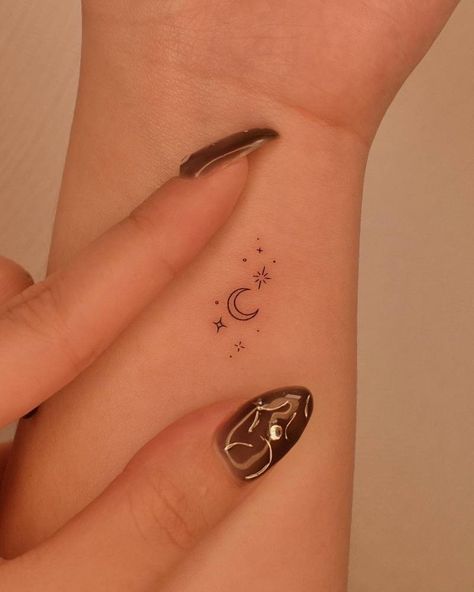 Tiny crescent moon and stars tattoo placed on the Unique Tattoo Inspiration, Small Wrist Tattoos For Women Unique, Amygdala Tattoo, Girl Small Tattoos, Mini Hand Tattoos, Minimalist Tattoo Aesthetic, Small Emo Tattoos, Aesthetic Small Tattoos, Patient Tattoo