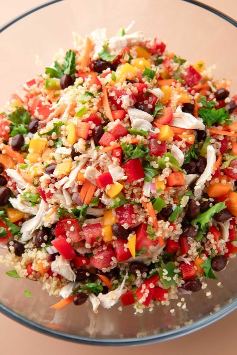 This flavorful and colorful Chicken Quinoa Salad is meal prep friendly loaded with veggie goodness! Shredded rotisserie chicken is paired with a medley of tomatoes, carrots, peppers, onion, black beans and kale and tossed with fluffy quinoa and the most flavorful dijon dressing. Chicken Peas Recipe, Beans And Kale, Fluffy Quinoa, Shredded Rotisserie Chicken, Chicken Quinoa Salad, Dijon Dressing, Cooked Quinoa, Chicken Quinoa, Baked Eggplant