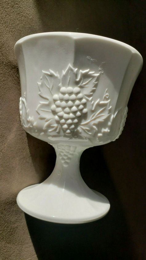 Rare Vintage Milk Glass Footed Flower Pot with Grapevine Pattern. Used in good condition. The only flaw is that the inside has some red stains. Still very beautiful. There was some residue from price tag in some of the pics but that is washed off now. It has some weight and size so postage is accordingly. 6.25 inches tall, 5.25 inches in diameter on top and 4 inches in diameter on the bottom. I accept offers on all my items but I do not negotiate the postage. Please read all pricing and info pri Decorating With Milk Glass Ideas, Milk Glass Display, Milk Glass Decor, Milk Glass Collection, Fenton Milk Glass, Red Stain, White Milk Glass, Vintage Dishes, Carnival Glass