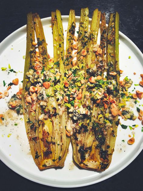 This Slow-Roasted Celery Will Be Your New Favorite Side Dish Thanksgiving Recipes Side Dishes Healthy, Thanksgiving Vegetable Side Dishes, Thanksgiving Vegetable Side, Celery Recipe, Roasted Celery, Thanksgiving Vegetable, Thanksgiving Recipes Side Dishes Veggies, Thanksgiving Vegetables Side Dishes, Turkey And Cranberry