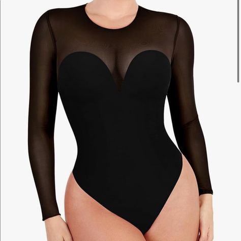 Long Sleeve Black Bodysuit. Built In Bra And Shapewear. Mesh Top. Black Corset Bodysuit, Black Nylon Bodysuit For Night Out, Black Nylon One-piece Leotard, Chic Black Sheer Swimwear, Elegant Black Swimming Bodysuit, Chic Black Nylon Bodysuit, Chic Black Leotard, Black Nylon Bodysuit With Lined Body, Black Nylon Bodysuit For Party