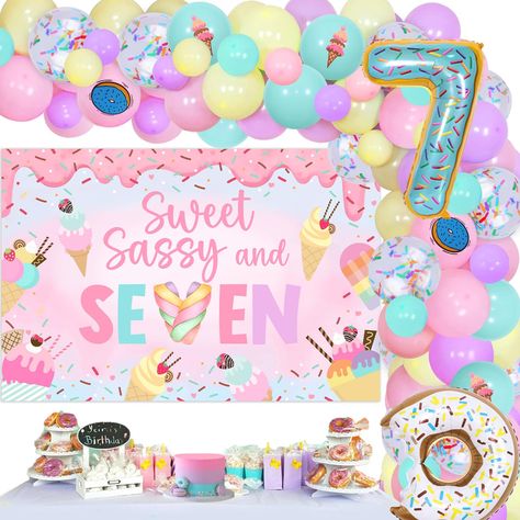 PRICES MAY VARY. Sweet sassy and seven: Our Sweet 7th Birthday decorations will create a magical and memorable birthday party for your little girl. The vibrant colors and sweet designs will make her feel like a princess on her special day. Donut ice-cream theme: The theme of our party decorations is centered around delicious donuts. The sweet sassy and seven backdrop features a colorful donut design with the words "Sweet, Sassy, and Seven" in bold letters. The donut balloons are also a great add 7 Is Sweet Birthday, Sweet Sassy Seven Birthday, Ice Cream And Donuts Birthday Party, 7th Birthday Girl Themes, Birthday Party Themes For Girls Age 7, Birthday Party Ideas For 7 Year Girl, Seven Birthday Theme, 7th Girl Birthday Party Ideas, 7 Birthday Party Ideas Girl