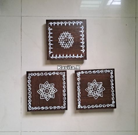 Pooja Peetham with Hridaya kamalam and Aishwarya kolam on a 8 inches plank with Deepam and swril border designs. Aishwarya Kolam, Kolam Coasters, Border Designs, Border Design, Coasters, Design