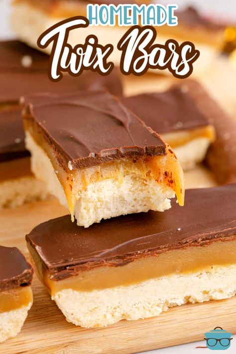 A homemade Twix Bar with a bite taken out on top of a few others. Potluck Treats, Twix Recipe, Millionaire Bars, Homemade Twix Bars, Homemade Candy Bars, Candy Bar Recipe, Twix Bars, Quit Work, Twix Bar