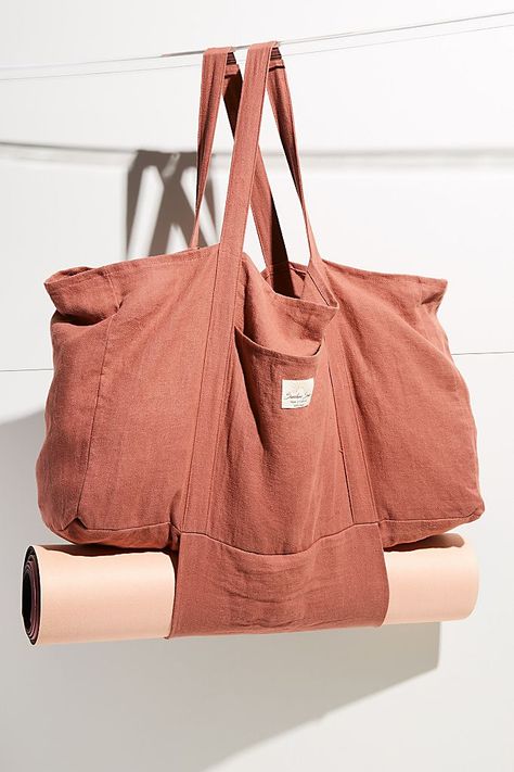 If the perfect weekend were a bag, it’d be this. Taking you from yoga to the farmers market to the beach, our Hemp Market Bag is made in California from sturdy, light weight 100% hemp canvas. We designed it to withstand everything our active lifestyles get up to so it’s good for salt, sweat, sand, and everything else. Shoulder straps extend to the bottom for extra strength and the front pocket makes it easy to grab and go. Materials: Our totes are made from 100% durable hemp lightweight canvas. Yoga Bag Pattern, Yoga Corner, Classroom Background, Yoga Tote, Free People Activewear, Oversized Tote Bag, Oversized Tote, Yoga Bag, Boho Bags