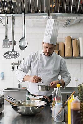 Milles Studio for Stocksy United Cook In Kitchen, Man Cooking Photography, Chef Cooking Photography Kitchens, Eating Pose, Chef Profile, Cook People, Chef Pictures, Cook Kitchen, Food Videography