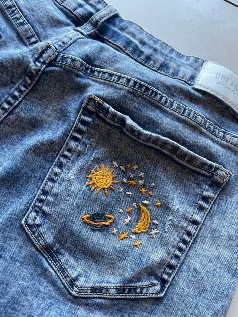 Size 15, embroidered space denim shorts. distressed secondhand YMI Jeans. Denim Jean Embroidery Ideas, Embroider Jeans Back Pocket, Jean Jacket Embroidered, Embroidery Designs Words, Shorts With Embroidery, Cross Stitch On Jeans, Easy Embroidery Clothes, Jean Cuff Embroidery, Jean Short Embroidery