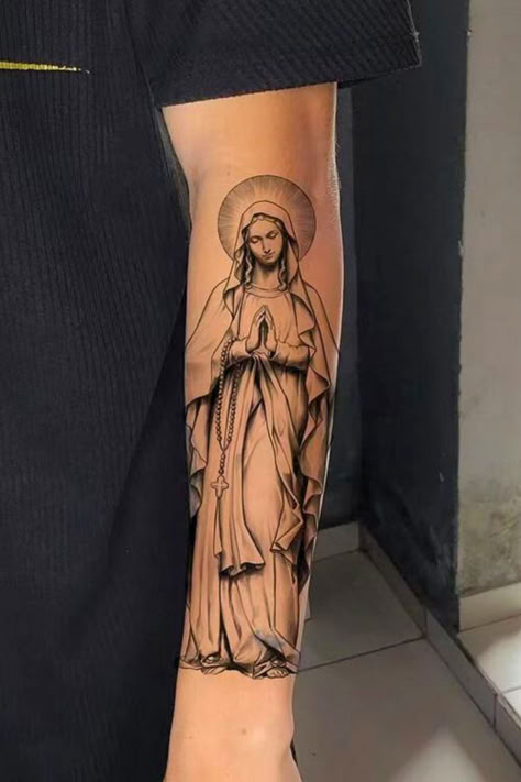 Tattoo Of Praying Hands With The Virgin Mary
#DeadVirgin #DeadMartTattoos #Marytattoo #tattooIdeas #TattooStyle #ChristianTattoo #TraditionalTattoo #ReligiousTattoo #Tattoo Virgin Mary Calf Tattoo, Blessed Mary Tattoo, Saint Maria Tattoo, Virgin Fatima Tattoo, Blessed Mother Tattoos Virgin Mary, Saint Tattoo Design, Catholic Sleeve Tattoo Men, Saint Cecilia Tattoo, Virgin Mary Arm Tattoo