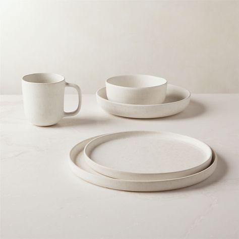 Modern Dinnerware Sets: Black Dishes, White Dishes & More | CB2 Stoneware Dinner Plates, Modern Plate Set, Fancy Dishes Dinners, Stonewear Dinner Sets, Cb2 Dinnerware, Cb2 Plates, Aesthetic Plates And Bowls, Ivory Dinnerware, Dinnerware Sets Unique