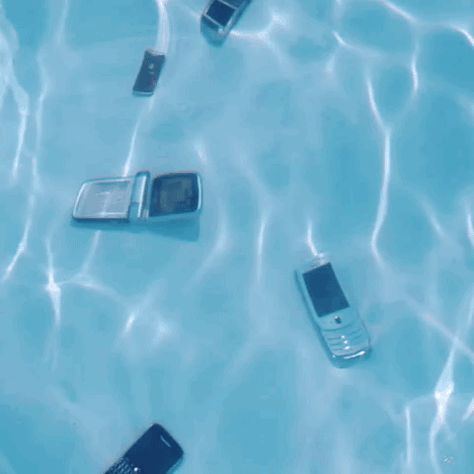 New trending GIF on Giphy Frutiger Aero Gif, Cybercore Gif, Swimming Pool Aesthetic, Phone Gif, Water Gif, Iphone Technology, Nokia 3310, Gif Art, Youtube Editing