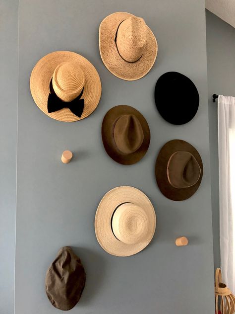 Hat Accent Wall, Hanging Fedoras On Wall, Cowboy Hat Display Wall Art, Wide Brim Hat Display, Hat And Purse Wall Display, Hat Hooks For Wall, Hat Pegboard, Hats Hung On Wall, Hat Wall Bedroom