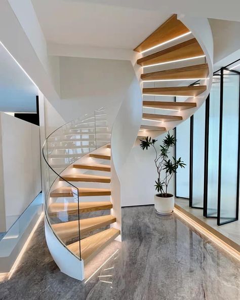 Penthouse Helical Staircase with Frameless Glass Railing and Led lighting (5) Glass Staircase Railing, Round Stairs, Spiral Stairs Design, Modern Stair Railing, Penthouse Design, Staircase Design Modern, Stairs Design Interior, Glass Stairs, Stair Railing Design