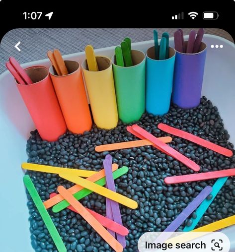 Colours Sensory Bin, Rainbow Theme Sensory Bin, Friends Sensory Bin, Simple Sensory Bin Ideas, Rainbow Preschool Sensory Bin, Colors Sensory Bin Preschool, March Sensory Bins For Preschool, Non Toxic Sensory Bin, Color Matching Popsicle Sticks