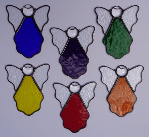 "Stained Glass Mini Angel Ornaments Suncatchers, Choice of colors If you buy three or more sent to the same address I will refund shipping (free shipping). These sweet little angels are perfect on a Christmas tree; gift package; hanging in a window; or a way to say \"I am thinking of you\". All have clear cabachons for the head, with twisted wire halos. The wings are clear textured glass. Each comes with a nylon line for hanging, ready for gift giving. They are approx. 4 1/2\" H x 3 1/2\" wide." Easy Stained Glass Christmas Ornaments, Christmas Stained Glass Ideas, Stained Glass Christmas Patterns, Stained Glass Christmas Ornaments, Etching Diy, Glass Angels, Fest Ideas, Diy Stained Glass Window, Mini Angel