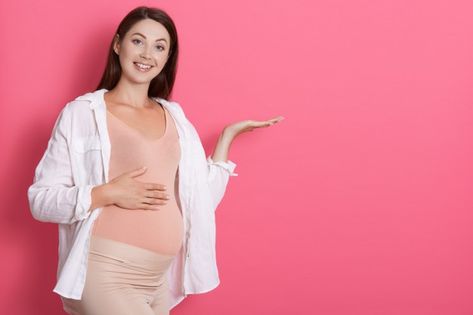 Lady Standing, Hands Open, Pregnant Girl, Pink Space, Pregnant Model, Pregnant Lady, Blonde Wavy Hair, Pregnant Mother, Baby Poses