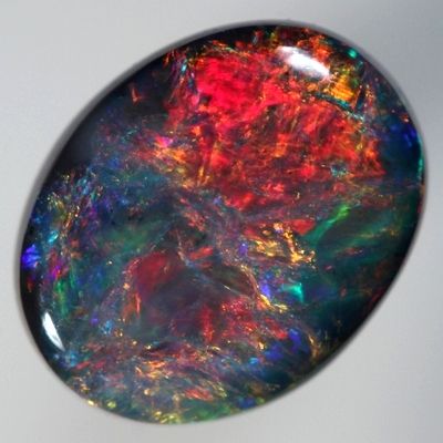 SOLID BLACK OPAL Top quality opal exploding with red. With VIDEO | AussieTreasureChest.com.au Black Gemstones, Black Pinterest, Burning Fire, Pretty Rocks, Winter Boho, Summer Street, Beautiful Rocks, Spring Jewelry, Lightning Ridge