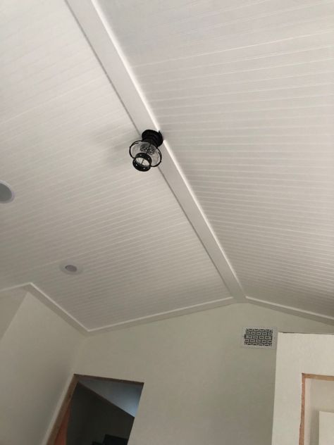 We installed 4x8 sheets of painted beadboard on the ceiling in the office. Then we trimmed it out with 1x4 trim boards and a 1x6 center board 1x4 Trim, Painted Beadboard, Angled Ceiling, Trim Board, Beadboard Ceiling, Bead Board, Backer Board, The Ceiling, Basement Ideas