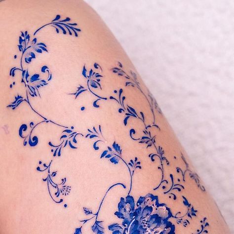 Oozy on Instagram: "Flowers in the thigh ❄️ . Done at @greystudiola . #oozy #oozytattoo #tattoo #kwadron" Oozy Tattoo Style, Blue China Patterns Tattoo, Blue Line Work Tattoo, China Blue Tattoo, Blue And White Porcelain Tattoo, China Plate Tattoo, Delft Tattoo Ideas, Blue Ornamental Tattoo, Blue Delft Tattoo