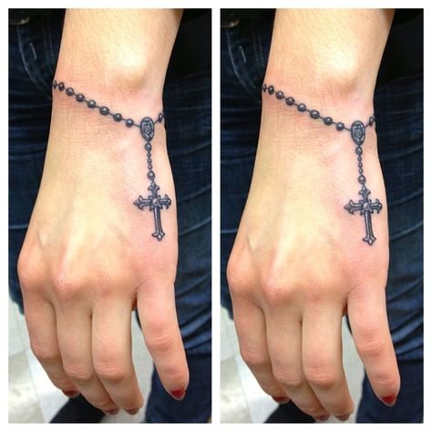 225+ Cute Rosary Tattoos Ideas and Designs (2023) - TattoosBoyGirl Rosary Tattoo Wrist, Roseary Tattoo, Rosary Tattoo On Hand, Rosary Bead Tattoo, Tattoo Lounge, Wrist Bracelet Tattoo, Tato Tradisional, Tattoo On Wrist, Rosary Tattoo