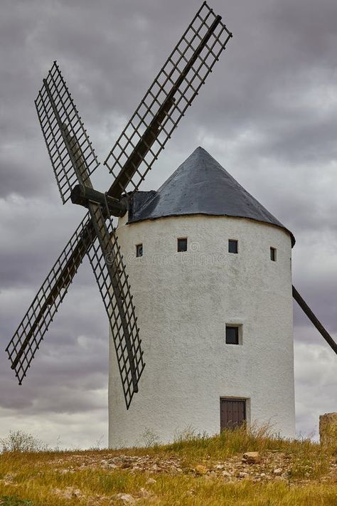 Old windmill in top of the hill in Spain stock image Windmill Aesthetic, Windmill Images, Land Of The Giants, Old Windmills, The Giants, Don Quixote, Nature Images, The Hill, Vector Logo