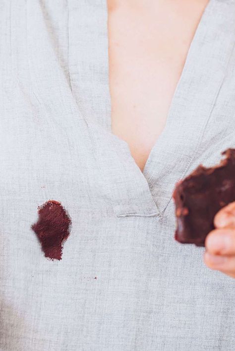 Learn four simple steps that can help you get both fresh and old chocolate stains out of clothing and other fabrics.  #cleaningguide #cleaninghacks #cleaningtips #realsimple #stepbystepcleaning #thespruce How To Get Chocolate Stains Out Of White, Removing Chocolate Stains, Stain Removal Guide, Chocolate Stains, Stain Remover Spray, Homemade Cleaning Solutions, Cleaning Guide, Liquid Dish Soap, Chocolate Icing