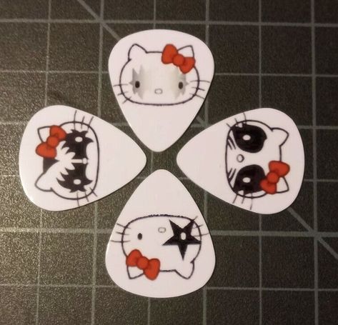 HELLO KITTY KISS FACES GUITAR PICKS - SET OF FOUR - FULL COLOR! | eBay Guitar Decoration Ideas, Cute Guitar Picks Aesthetic, Sanrio Electric Guitar, Hello Kitty Guitar Pick, Hello Kitty Kiss, Cute Guitar Picks, Pink Hello Kitty Guitar, Pretty Guitar Picks, Hello Kitty Guitar